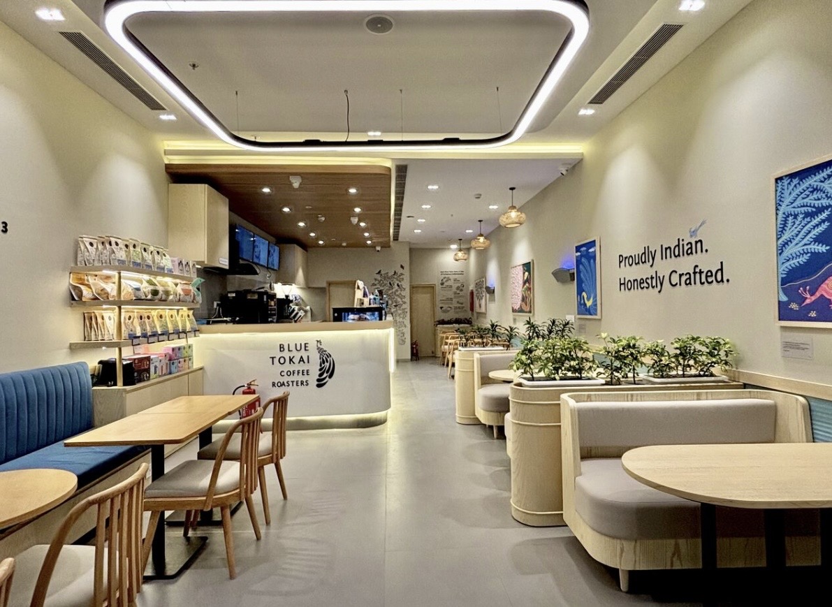Booth seating lit with a linear ring fixture overhead
